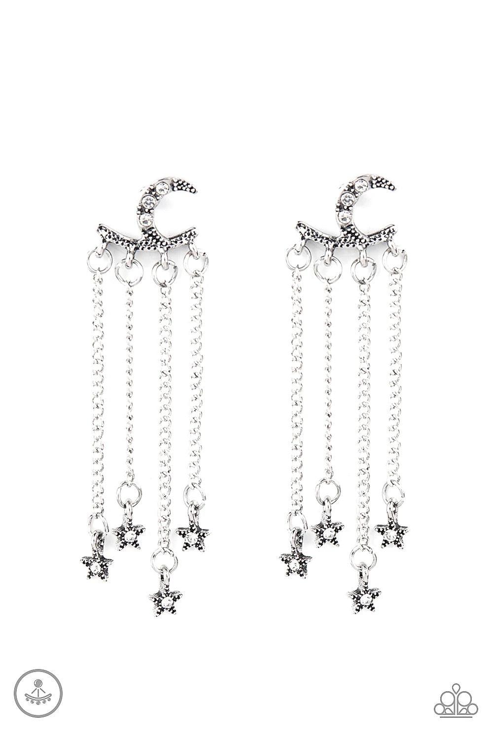 Paparazzi Accessories Cosmic Goddess - Silver Encrusted in dainty white rhinestones, a studded silver moon fitting attaches to a double-sided post designed to fasten behind the ear. Dotted in dainty white rhinestones, dainty silver stars swing from a curt