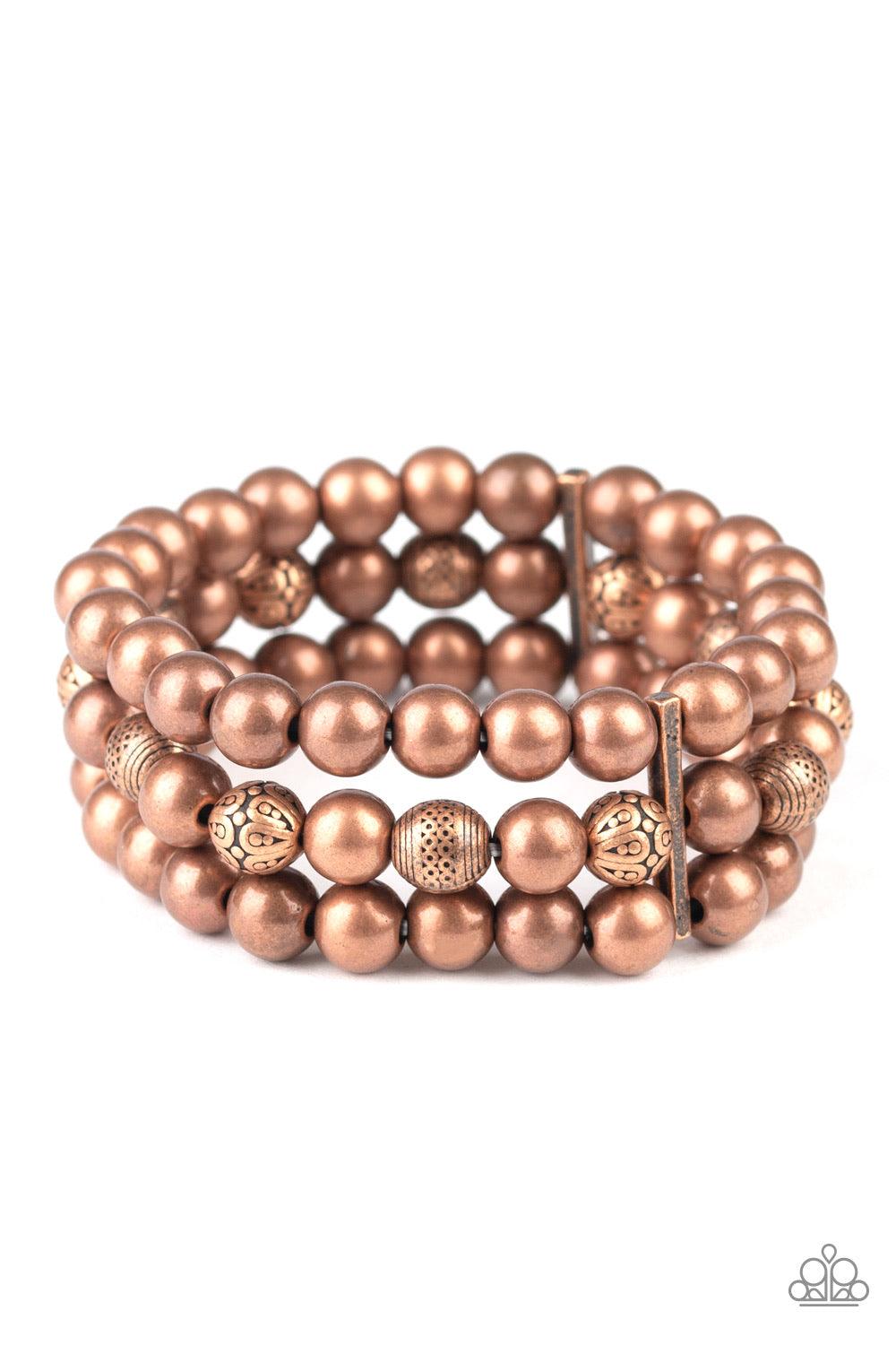 Paparazzi Accessories Trail Treasure - Copper Held together by dainty copper fittings, a collection of antiqued and decorative copper beads are threaded along stretchy bands around the wrist for a trendy layered look. Jewelry