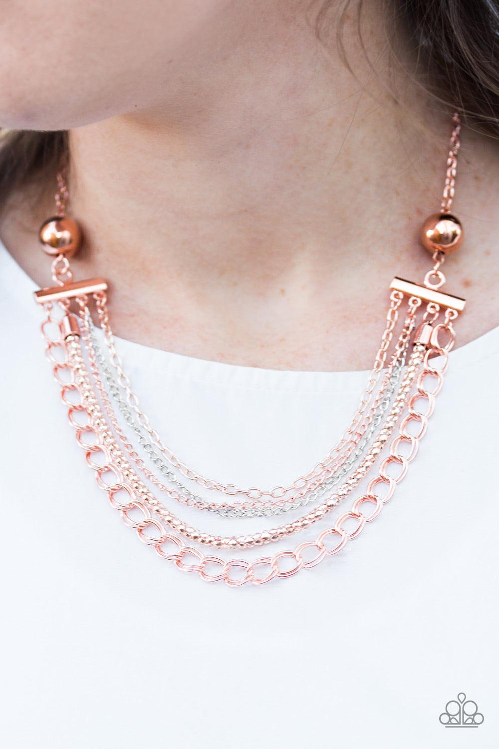 Paparazzi Accessories Intensely Intense - Copper Two shiny copper beads give way to an array of silver, rose gold, and shiny copper chains. Strung between two shiny copper beads, the mismatched chains layer below the collar in a spunky mixed metallic fash