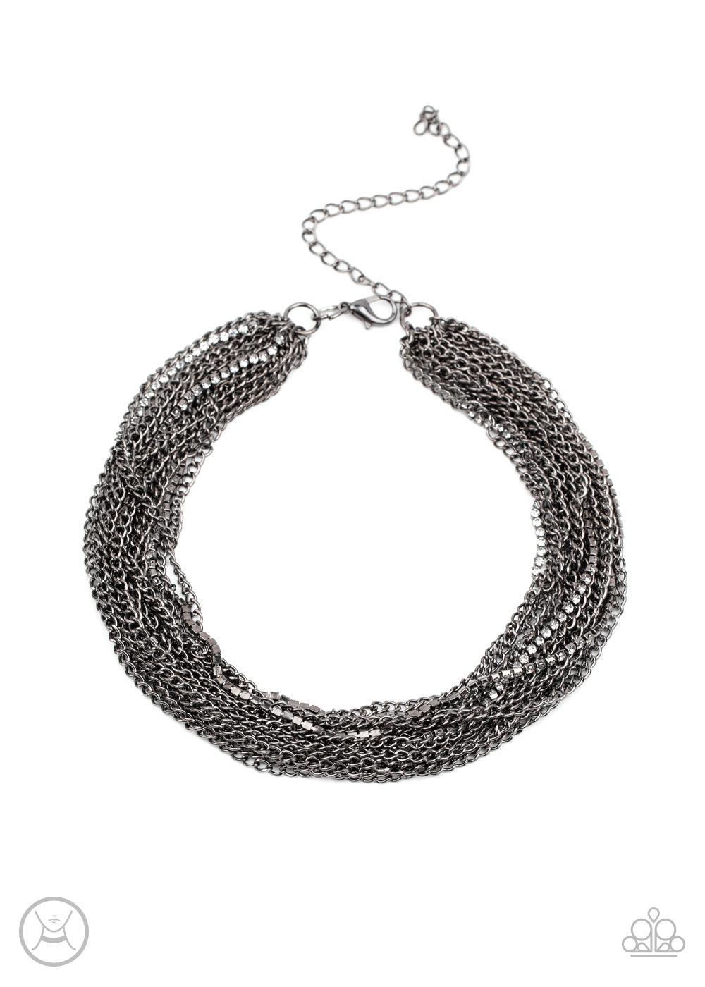 Paparazzi Accessories Catch You Layer! - Black Hints of glittery white rhinestones peek out between layer after layer of glistening gunmetal chains, creating a dramatic display around the neck. Features an adjustable clasp closure. Sold as one individual