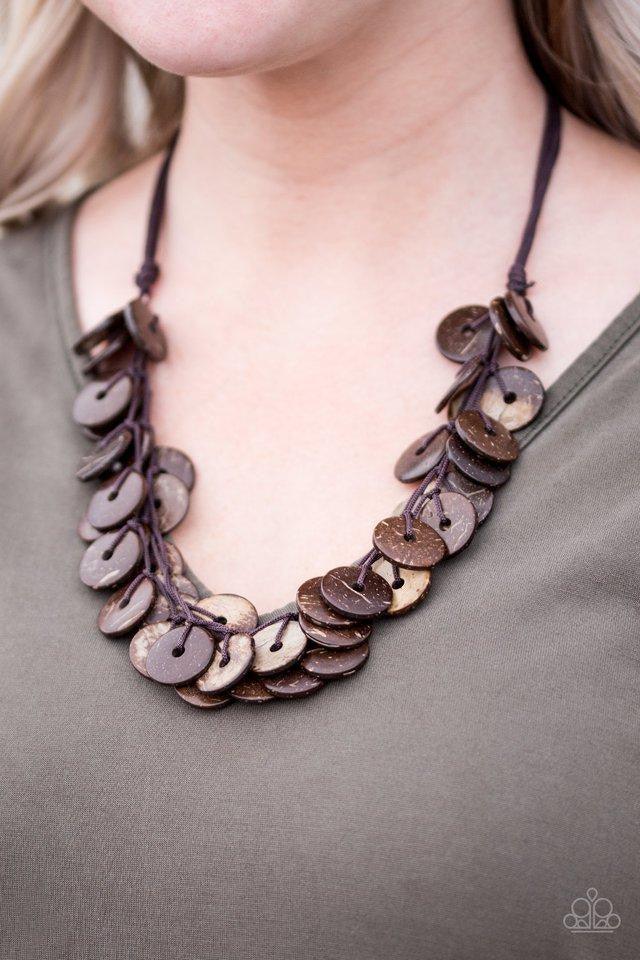 Paparazzi Accessories Jammin in Jamaica - Brown Shiny wooden discs brushed in a brown finish trickle along shiny brown cording, creating clustered layers below the collar. Features a button-loop closure. Sold as one individual necklace. Includes one pair