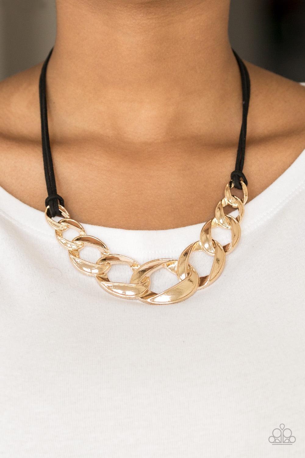 Paparazzi Accessories Naturally Nautical - Gold Strands of black suede knot around interconnecting gold links, creating a bold pendant below the collar. Features an adjustable clasp closure. Jewelry