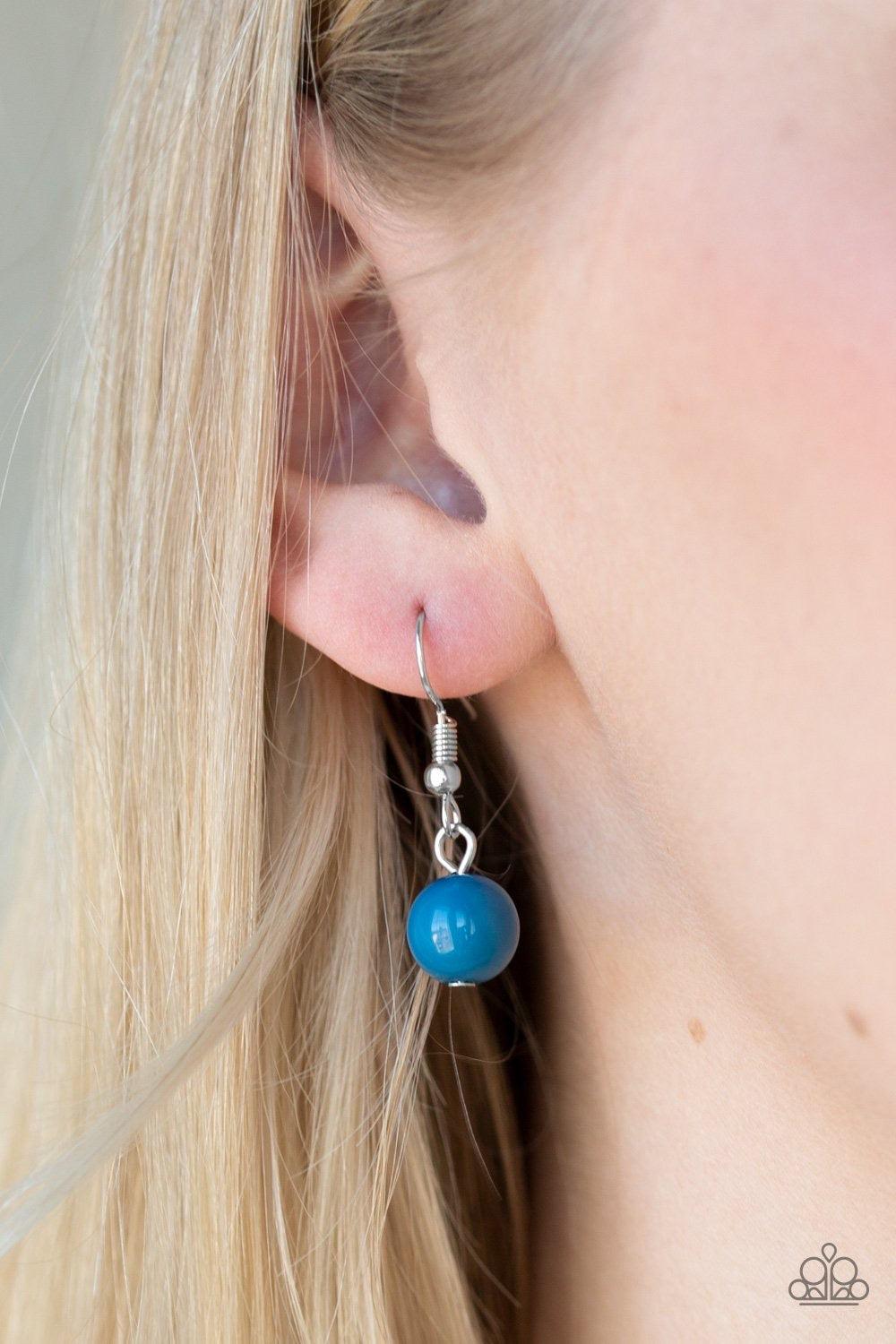 Paparazzi Accessories Soul Quest - Blue Polished and crystal-like blue beads trickle along a shimmery silver chain, giving way to a glistening teardrop pendant. Infused with studded detail and a matching blue beaded center, the ornate pendant gives way to