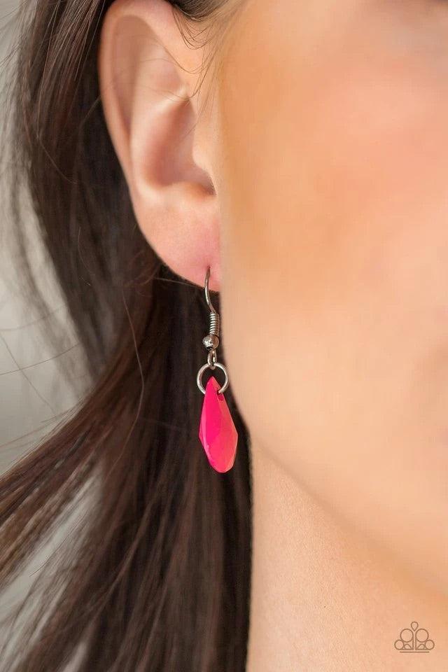 Paparazzi Accessories Hurricane Season - Pink Glassy and polished pink teardrops drip from the bottom of a shimmery gunmetal chain. Faceted gunmetal teardrops trickle between the colorful beading, adding a flashy finish to the flirtatious fringe. Features