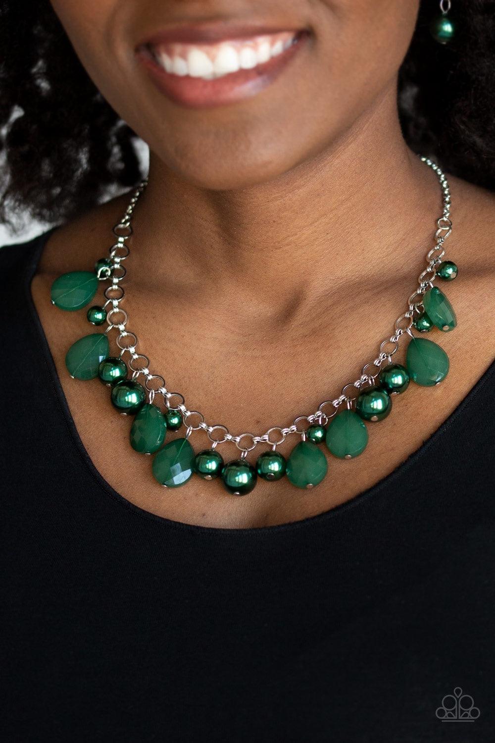 Paparazzi Accessories Pacific Posh - Green A refined collection of opaque green teardrops and pearly green beads swing from shimmery silver links below the collar, creating a fabulous fringe. Features an adjustable clasp closure. Jewelry