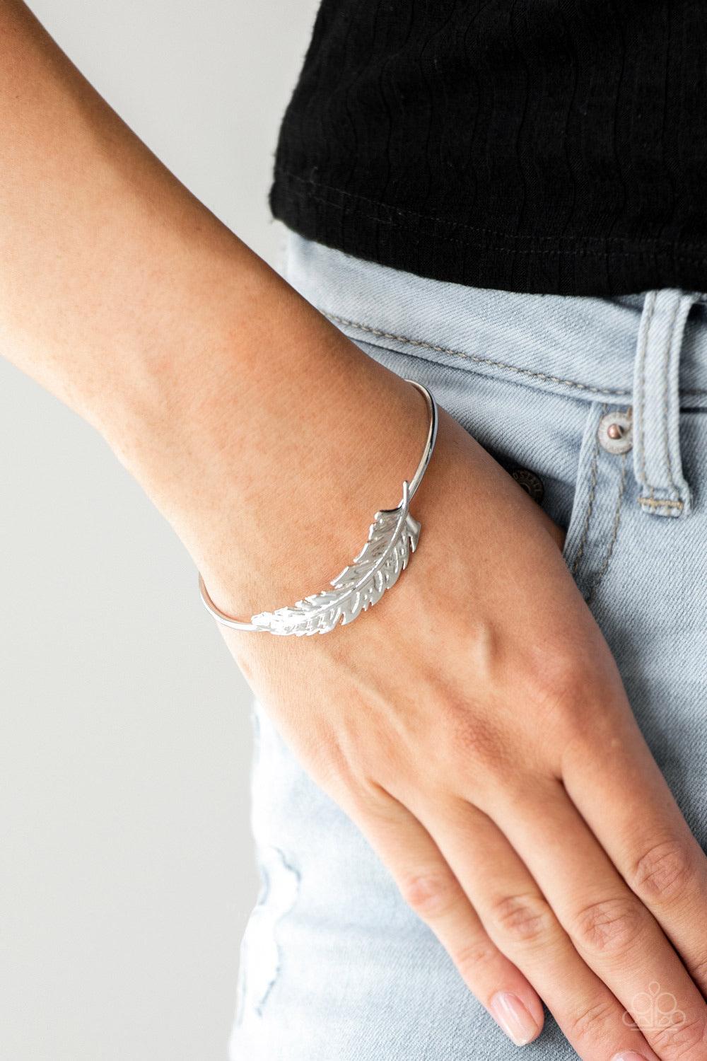Paparazzi Accessories How Do You Like This FEATHER? - Silver Featuring life-like detail, a shimmery silver feather folds along a dainty silver cuff for a seasonal look. Jewelry