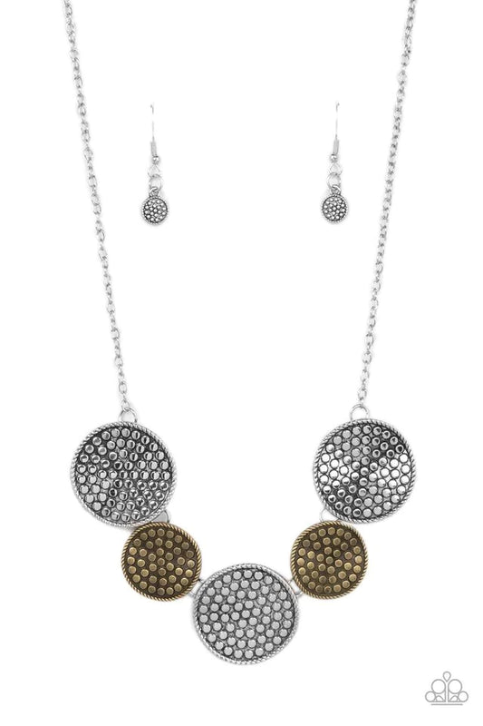 Paparazzi Accessories Self DISC-overy - Multi Embossed in a dotted motif, a rustic collection of warped silver and brass discs ruggedly links below the collar for an artisan inspired fashion. Features an adjustable clasp closure. Sold as one individual ne