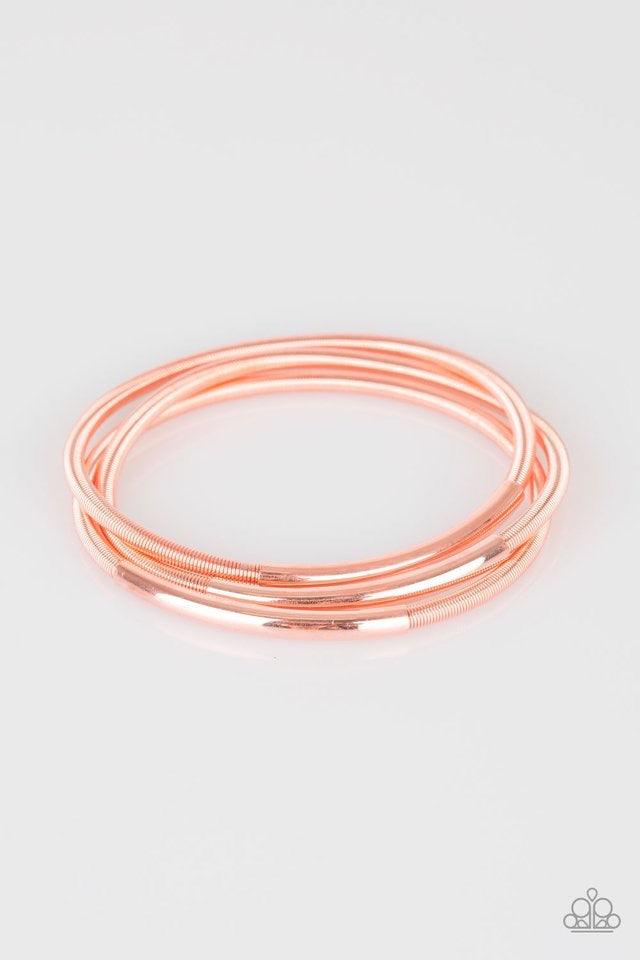 Paparazzi Accessories It’s A Stretch - Copper A collection of shiny copper accents slide along stretchy spring-like wires for a sleek industrial look. Jewelry