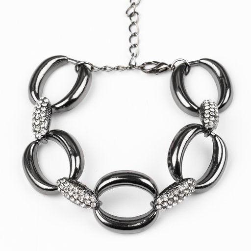 Paparazzi Accessories Don’t Forget Who’s Boss - Black Bold gunmetal links join with white rhinestone encrusted frames around the wrist for a fierce look. Features an adjustable clasp closure. Sold as one individual bracelet. Jewelry