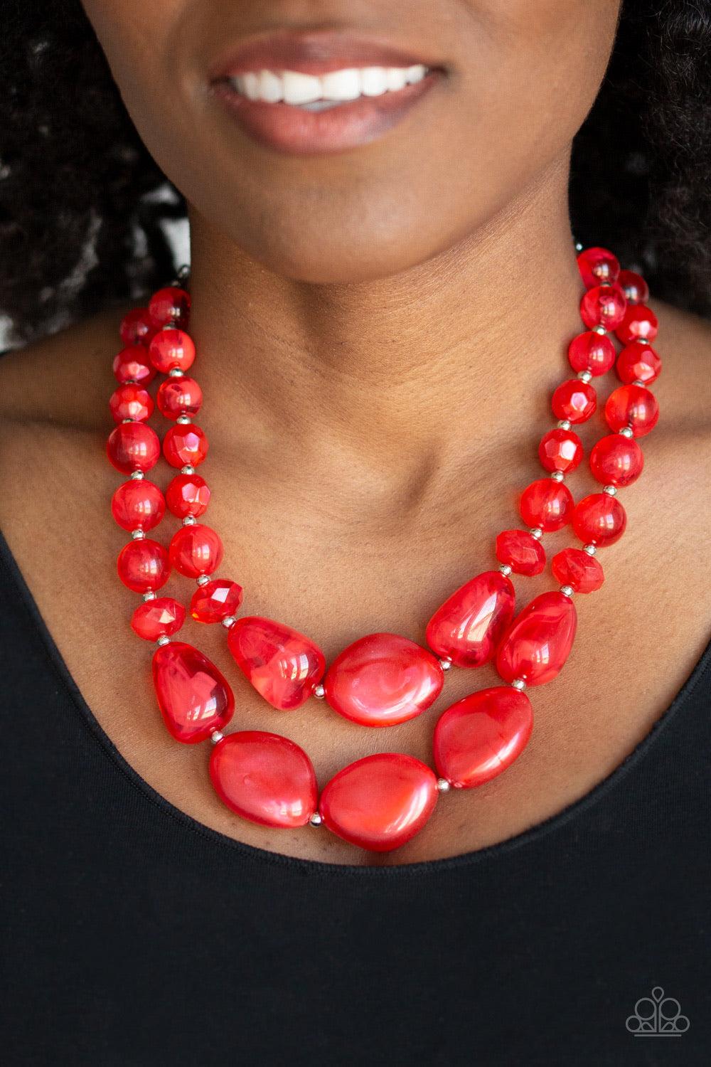 Paparazzi Accessories Beach Glam - Red Varying in shape and opacity, a refreshing collection of glassy and iridescent red beads layer below the collar for a boldly colorful look. Features an adjustable clasp closure. Sold as one individual necklace. Inclu