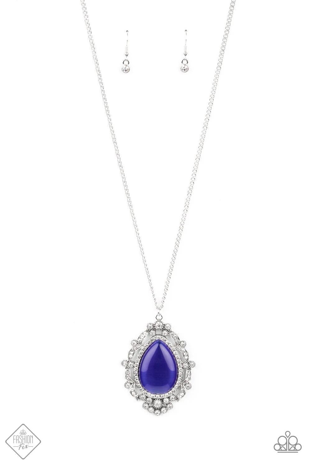 Paparazzi Accessories Frozen Gardens ~Blue Dotted in glittery white rhinestones, leafy silver frames nestle around a glowing Classic Blue cat's eye teardrop center, creating a regal pendant at the bottom of a lengthened silver chain. Features an adjustabl