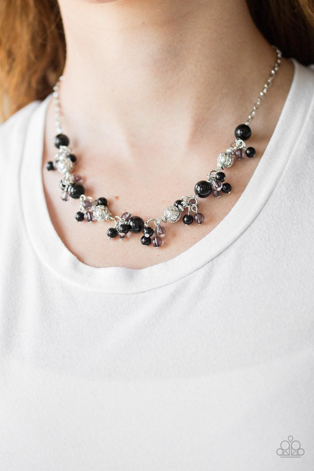 Paparazzi Accessories Weekday Wedding -Black Wrapped in shimmery wire mesh, classic silver beads and shiny black beads trickle along a glistening silver chain below the collar. Featuring glassy and polished finishes, clusters of dainty black beads dangle