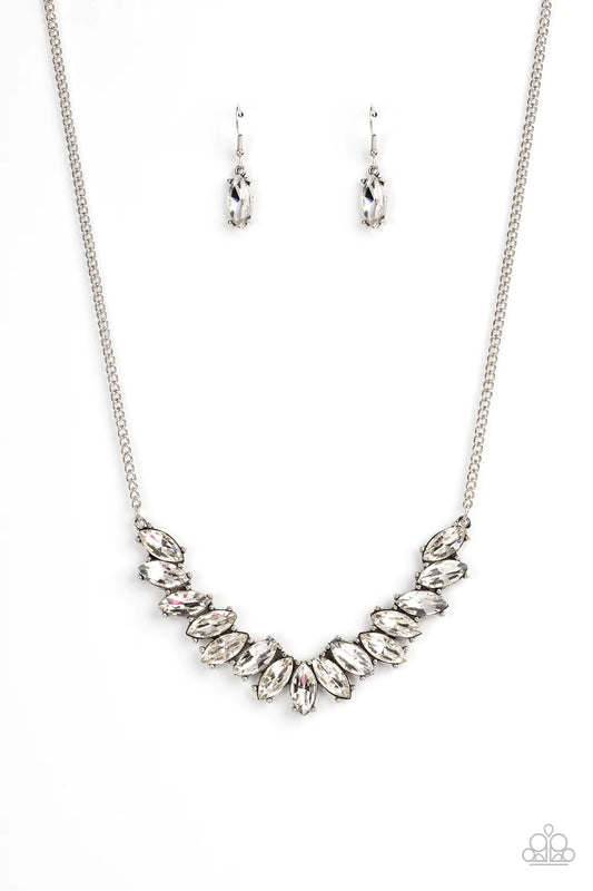 Paparazzi Accessories Galaxy Game Changer - White Featuring pronged silver fittings, a sparkly series of white marquise cut rhinestones fan out below the collar for a stellar statement-making look. Features an adjustable clasp closure. Sold as one individ