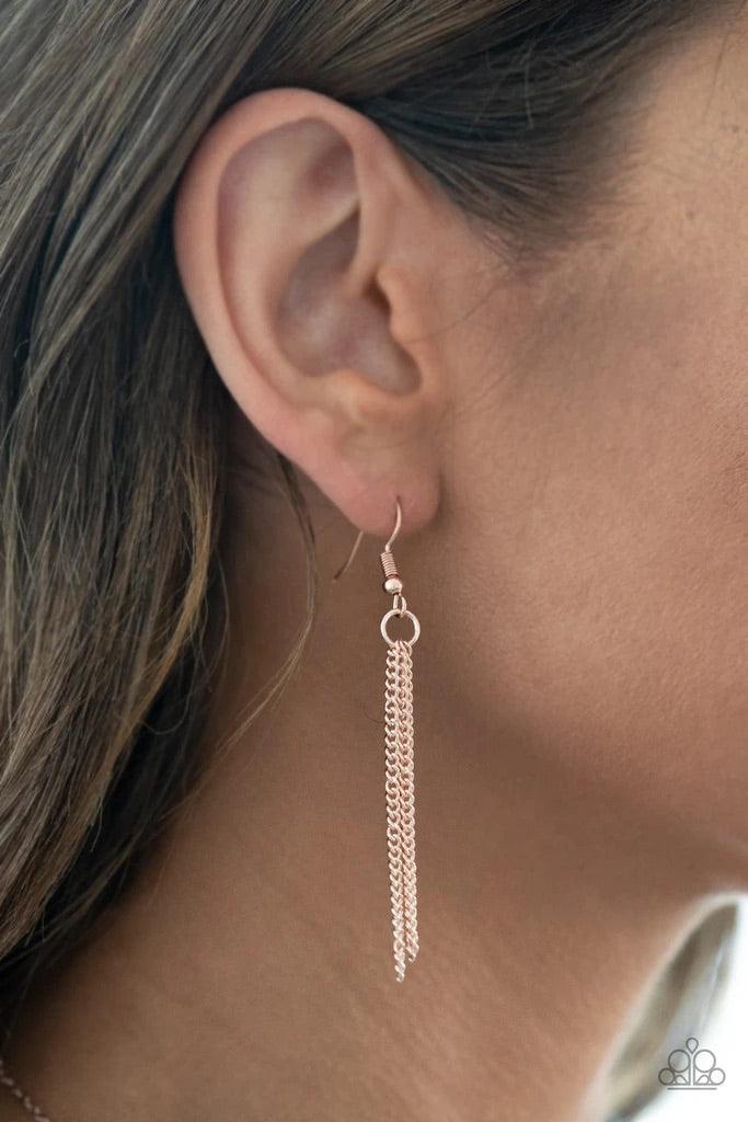 Paparazzi Accessories Floral Embrace - Rose Gold A delightful bouquet of pressed flowers encased in a rose gold frame gently sway from a delicate rose gold chain accented with rose gold beads. Features an adjustable clasp closure. Sold as one individual n
