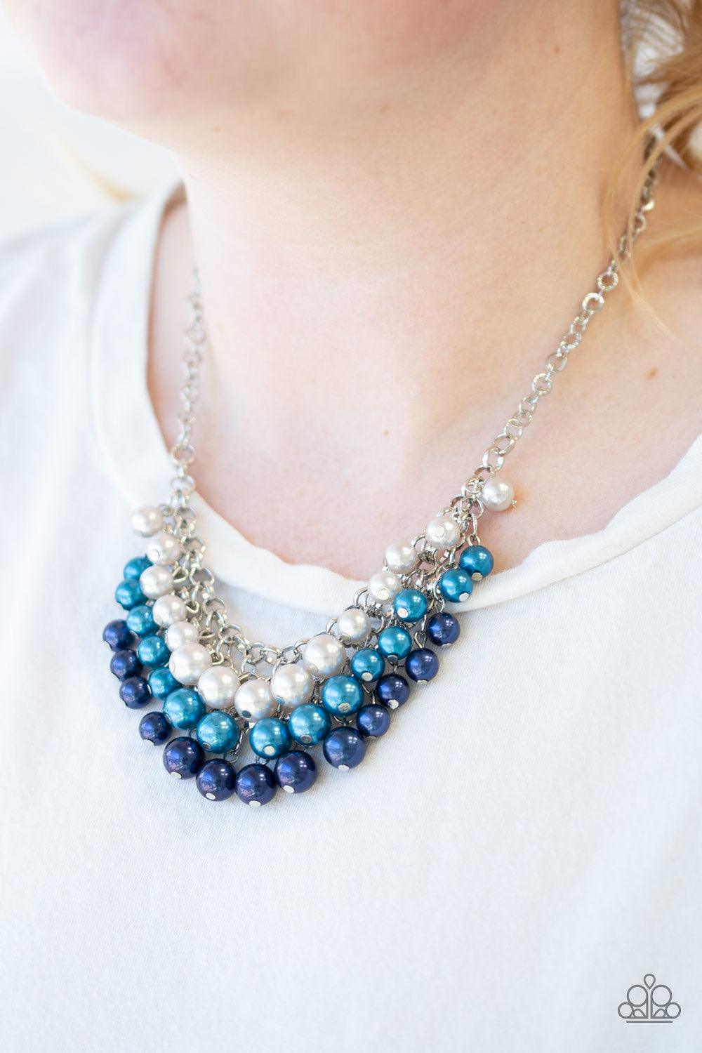 Paparazzi Accessories Run For The HEELS! - Blue Rows of white, light blue, and dark blue pearls cascade below the collar, creating a glamorous fringe. Features an adjustable clasp closure. Sold as one individual necklace. Includes one pair of matching ear