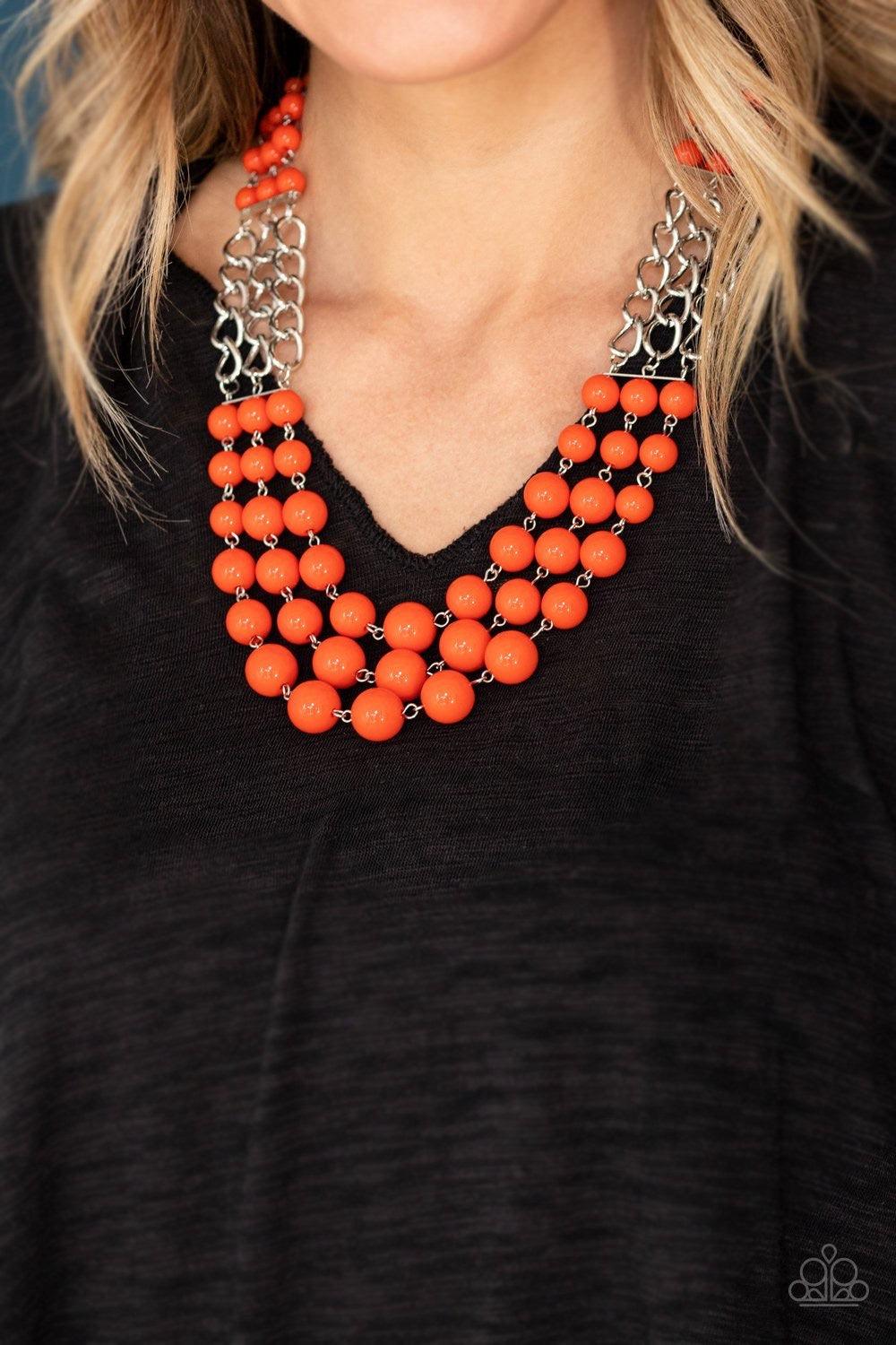 Paparazzi Accessories A La Vogue - Orange Sections of thick silver chains and bubbly orange beaded rows layer below the collar, creating statement-making layers. Features an adjustable clasp closure. Jewelry