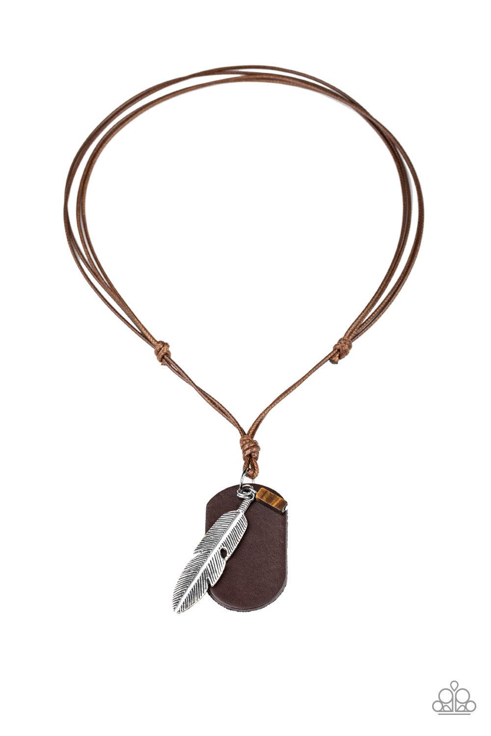 Paparazzi Accessories Flying Solo - Brown A brown leather dog tag, lifelike silver feather, and refreshing tiger's eye stone are knotted in place at the bottom of a shiny brown cord for an urban style. Features an adjustable sliding knot closure. Jewelry