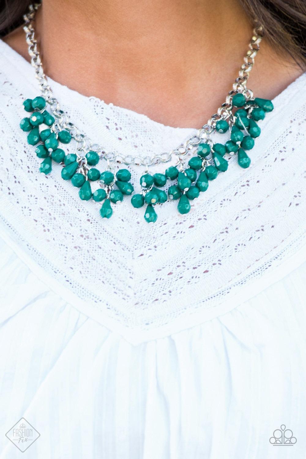 Paparazzi Accessories Modern Macarena - Green Featuring round and teardrop shapes, clusters of faceted Quetzal Green beads swing from the bottom of a shimmery silver chain, creating a playful fringe below the collar. Features an adjustable clasp closure.