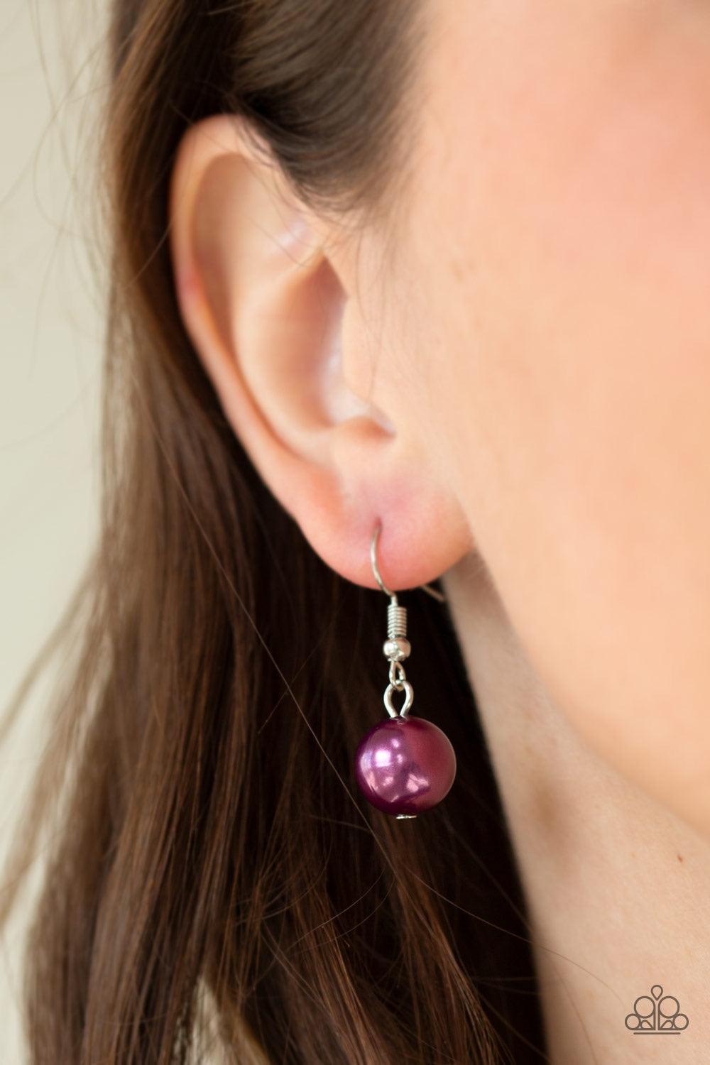 Paparazzi Accessories 5th Avenue A-Lister - Purple Separated by dainty silver beads, classic white pearls merge into purple pearls for a contemporary look. Infused with a shiny silver bead, the timeless pearls collect below the collar for a refined asymme