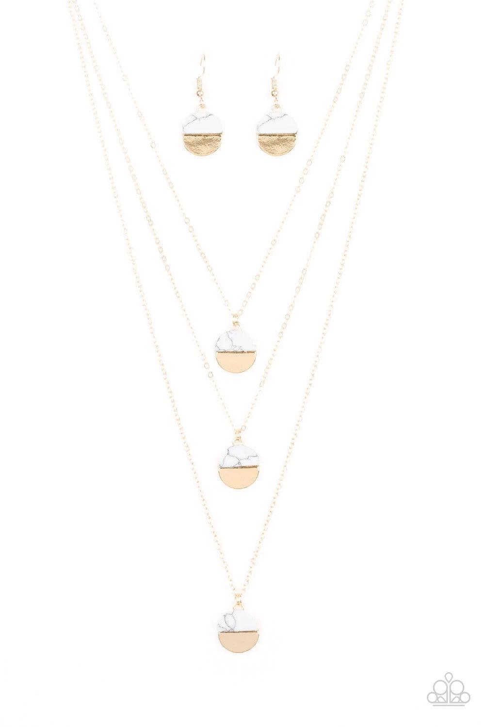 Paparazzi Accessories Rural Reconstruction - Gold Featuring refreshing white stone accents, a trio of gold discs layer down the chest for a seasonal look. Features an adjustable clasp closure. Sold as one individual necklace. Includes one pair of matching
