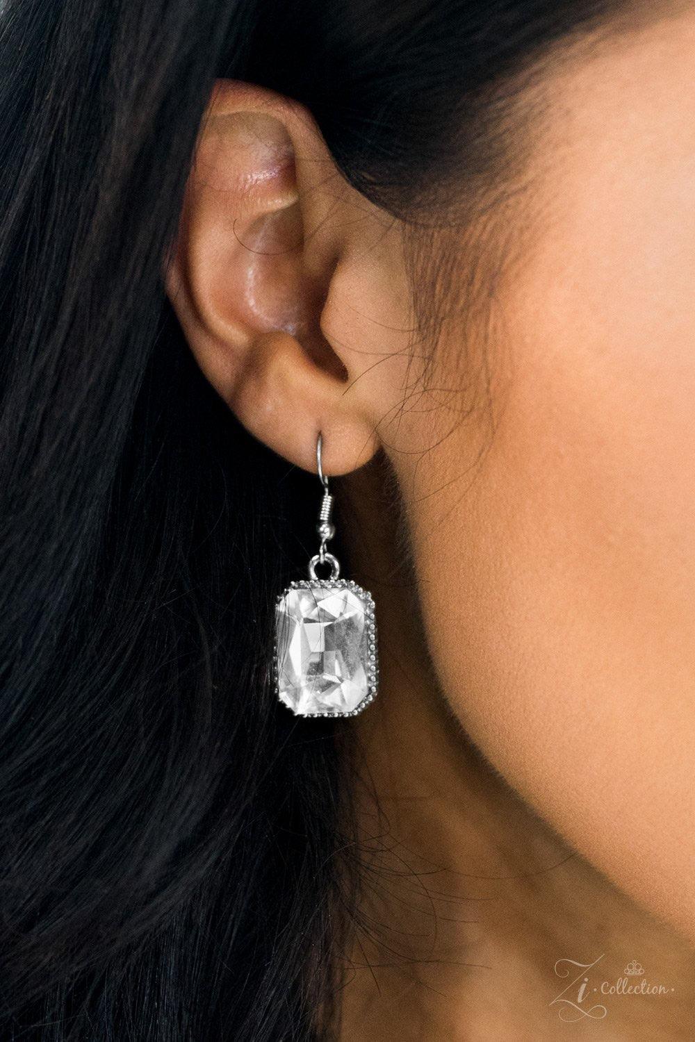 Paparazzi Accessories You-Phoria Featuring an array of round, marquise, teardrop, and elegant emerald style cuts, glittery white gems fan below the collar. Encased in sleek silver frames, the dramatic gems catch and reflect the light, casting blinding shi