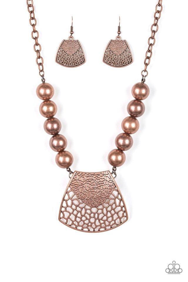 Paparazzi Accessories Large And In Charge - Copper Featuring ornately stenciled and embossed details, a flared copper plate swings from a boldly copper beaded chain below the collar for a fierce look. Features an adjustable clasp closure. Jewelry