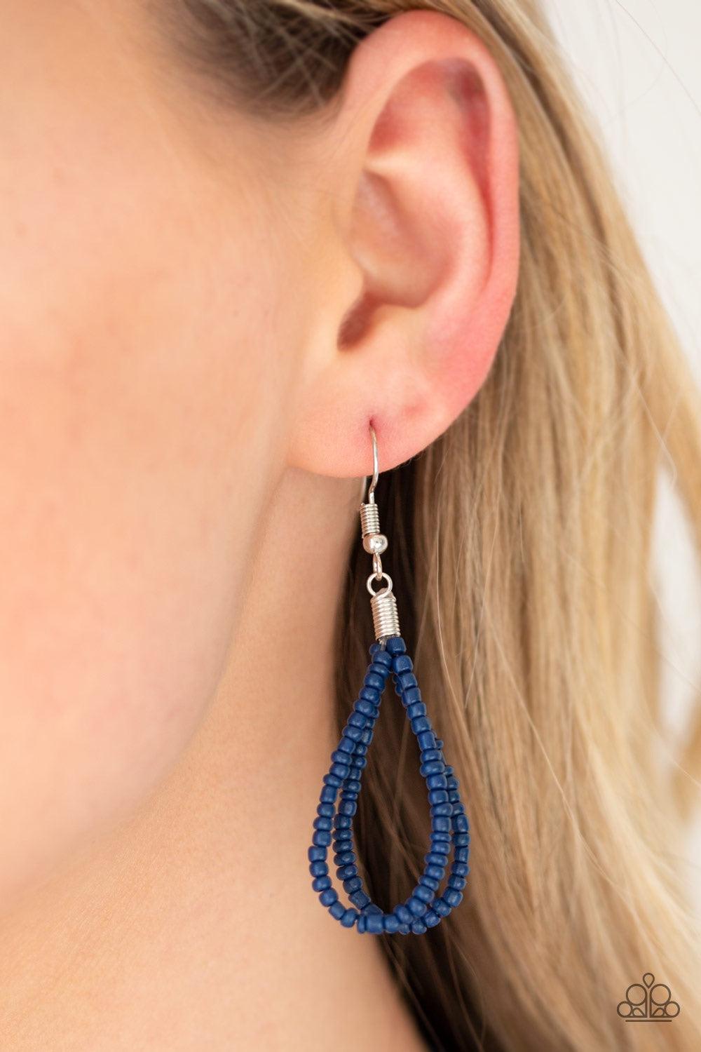 Paparazzi Accessories Totally Tonga - Blue Varying in size, row after row of shiny blue seed beads cascade down the chest, creating summery layers. Features an adjustable clasp closure. Jewelry