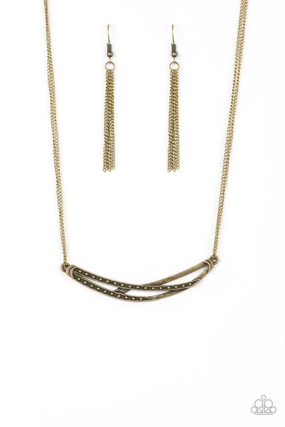 Paparazzi Accessories Moro Modern - Brass Dotted and hammered brass bars crisscross below the collar, coalescing into an edgy crescent-shaped pendant. Features an adjustable clasp closure. Sold as one individual necklace. Includes one pair of matching ear