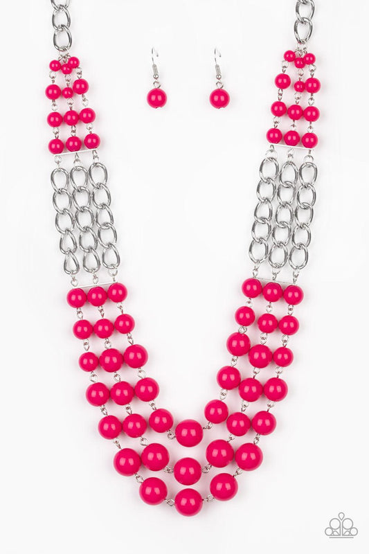 Paparazzi Accessories A La Vogue - Pink Sections of thick silver chains and bubbly pink beaded rows layer below the collar, creating statement-making layers. Features an adjustable clasp closure. Sold as one individual necklace. Includes one pair of match