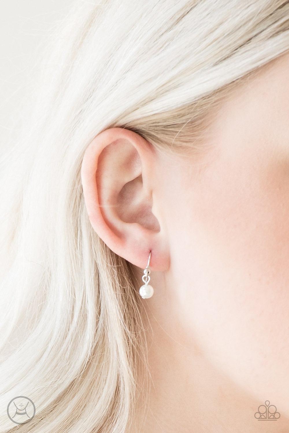 Paparazzi Accessories Ladies Choice - White Varying in size, two strands of dainty white pearls wrap around the neck for a refined look. Features an adjustable clasp closure. Jewelry