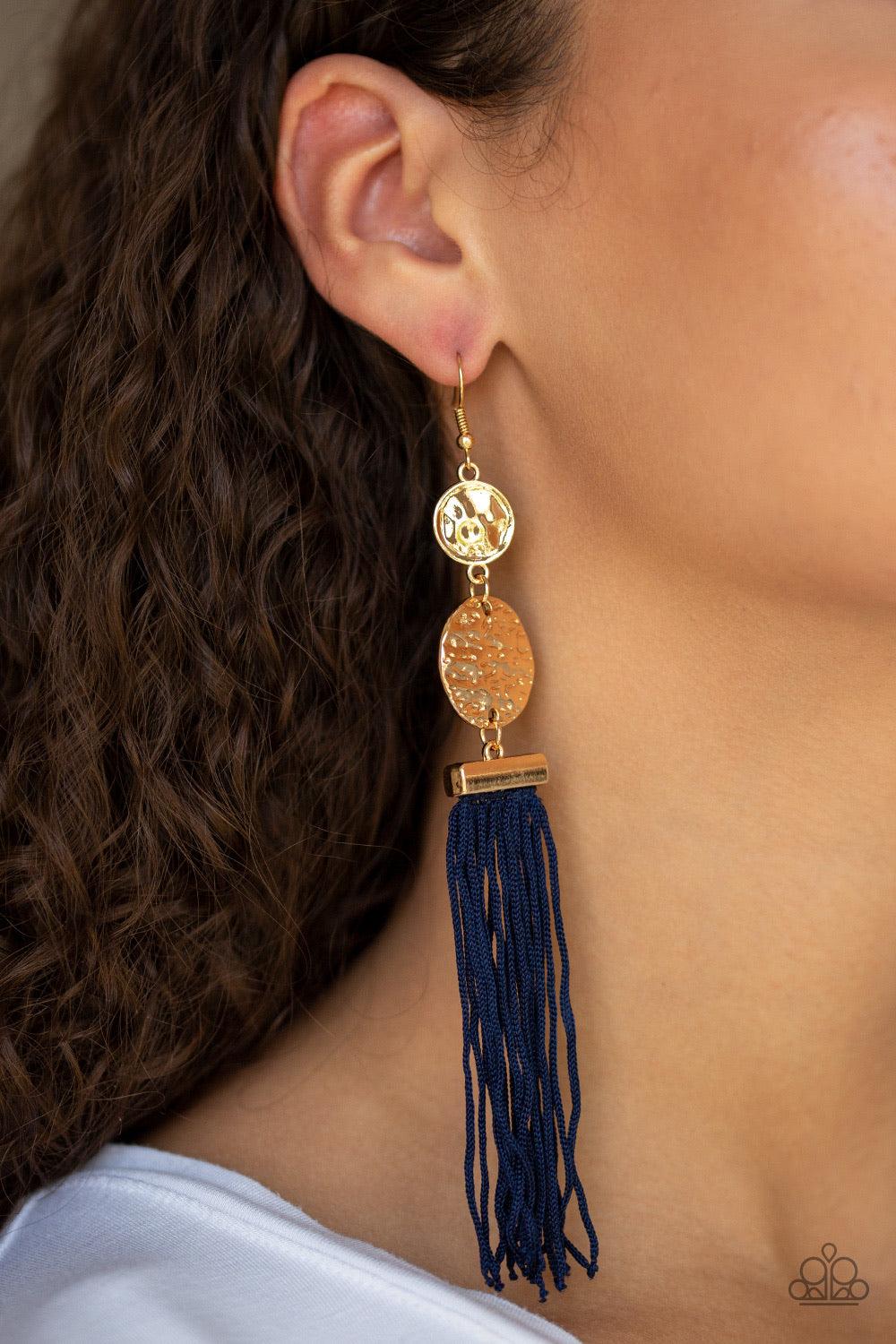 Paparazzi Accessories Lotus Gardena - Blue A collection of Evening Blue cording streams from the bottom of stacked hammered gold discs, creating a whimsical tassel. Earring attaches to a standard fishhook fitting. Jewelry
