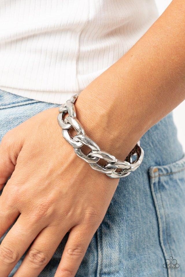 Paparazzi Accessories Living Off The GRIT - Silver Brushed in an antiqued shimmer, oversized silver chain links boldly connect into a gritty cuff around the wrist. Sold as one individual bracelet Jewelry