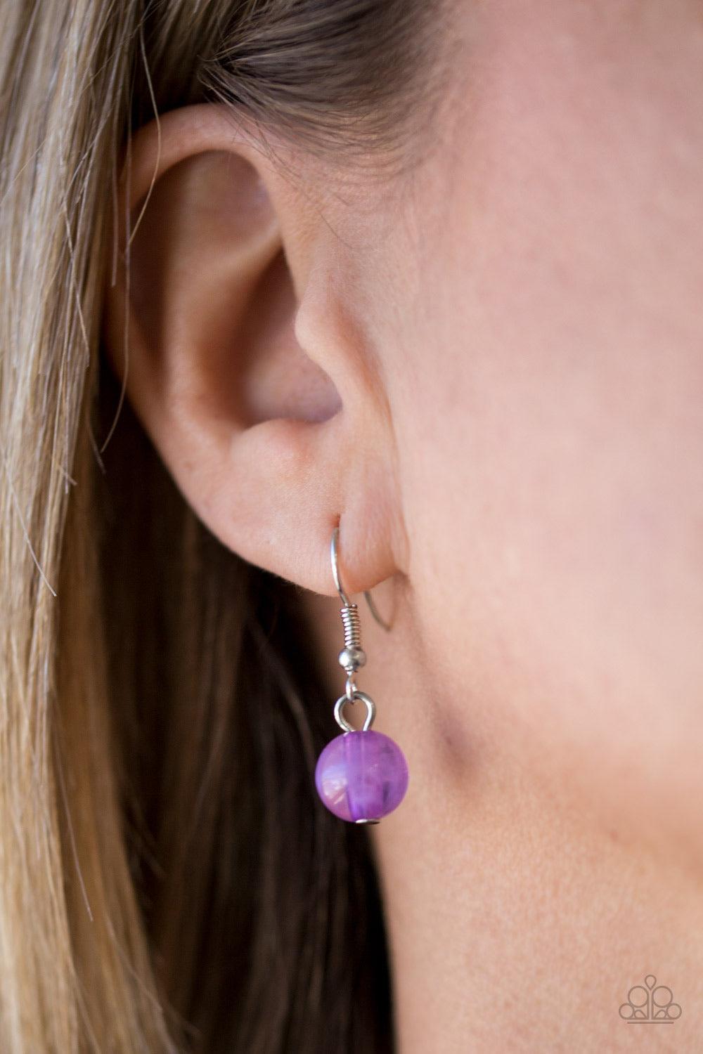 Paparazzi Accessories Trending Tropicana ~Purple A row of cloudy purple beads gives way to a row of shiny silver beads. Brushed in an opalescent finish, purple teardrops cascade from the bottom of bold interlocking silver chains, creating a dramatically c