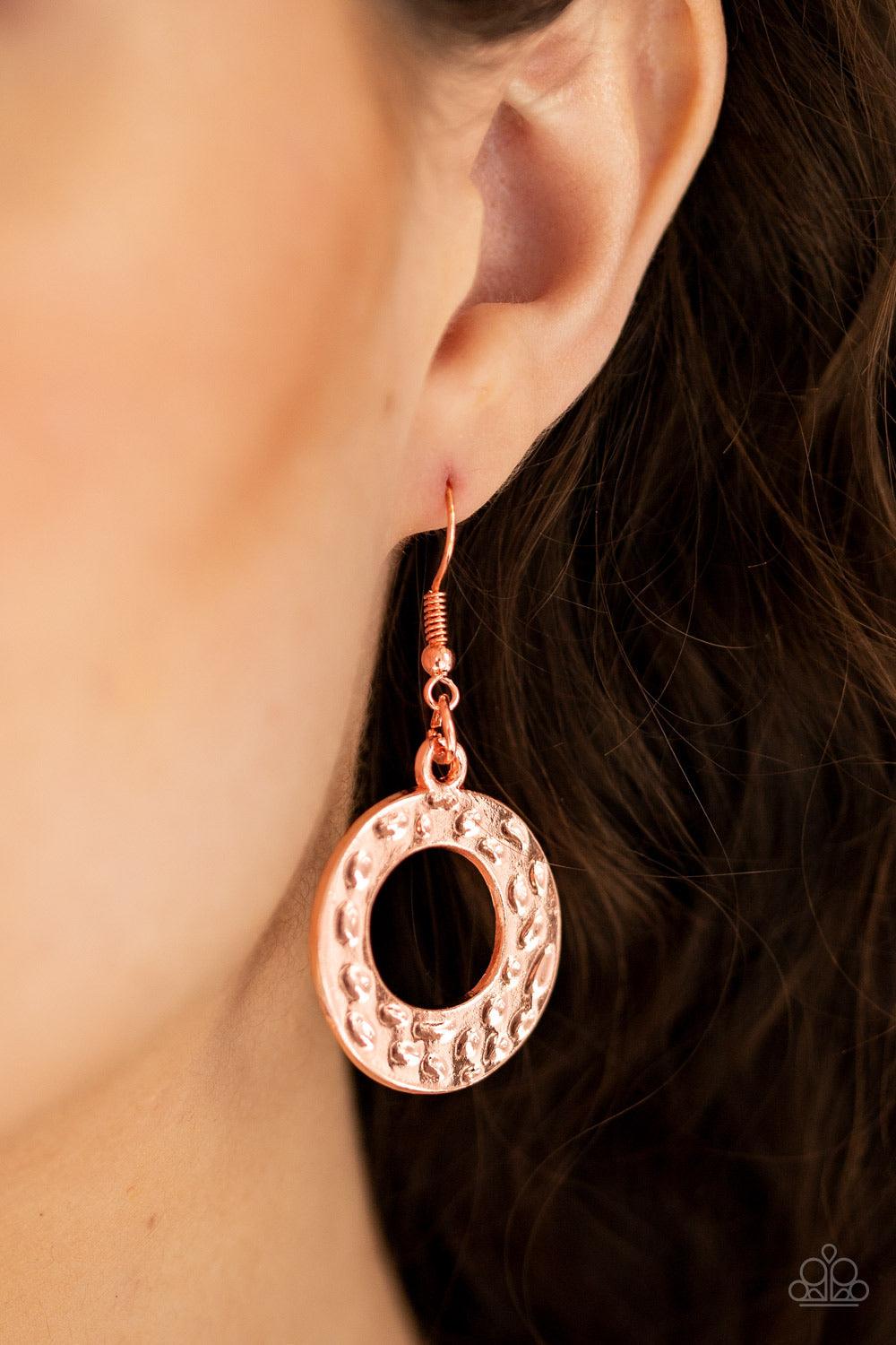 Paparazzi Accessories Mildly Metro - Copper Gradually increasing in size, hammered shiny copper circles link below the collar for a statement-making look. Features an adjustable clasp closure Jewelry