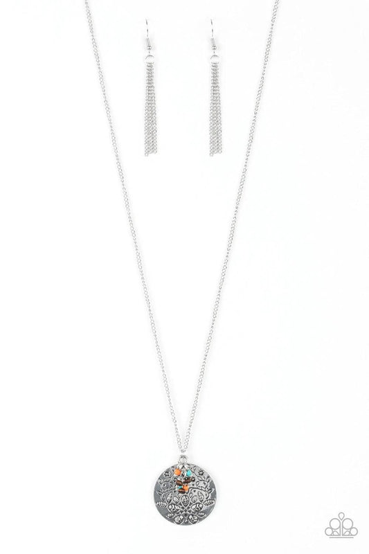 Paparazzi Accessories Desert Abundance - Multi A floral embossed silver disc and dainty wooden and multicolored stone beads swing from the bottom of a lengthened silver chain for whimsical look. Features an adjustable clasp closure. Sold as one individual