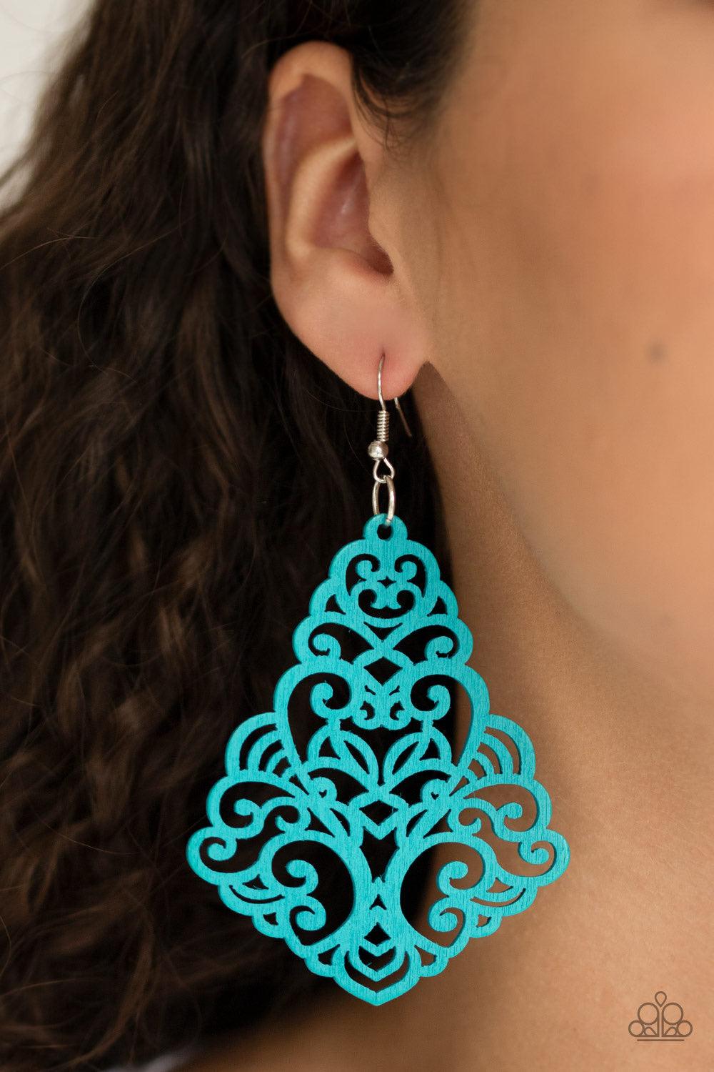 Paparazzi Accessories Powers of ZEN - Blue Painted in a refreshing blue finish, an airy wooden frame swirling with filigree detail swings from the ear for a seasonal look. Earring attaches to a standard fishhook fitting. Jewelry