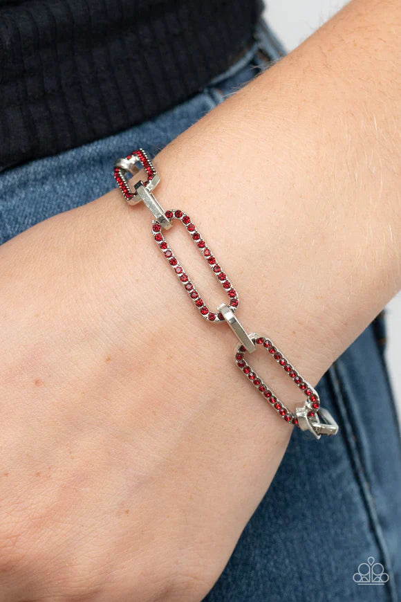 Paparazzi Accessories Still Not OVAL You - Red Dotted in dainty red rhinestones, oblong silver frames link with shiny silver fittings around the wrist for a timeless twinkle. Features an adjustable clasp closure. Sold as one individual bracelet. Bracelets