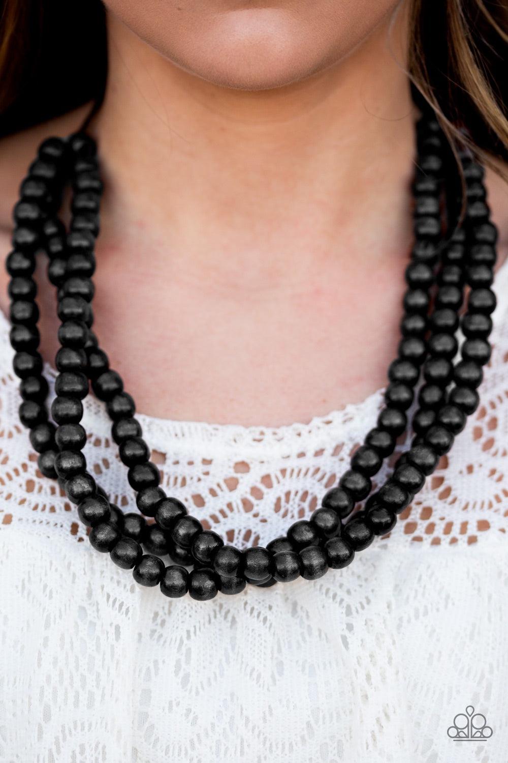 Paparazzi Accessories Summer Mai Tai - Black Tinted in a black finish, wooden beads are threaded along black cording, creating three colorful layers below the collar. Features a button-loop closure. Jewelry