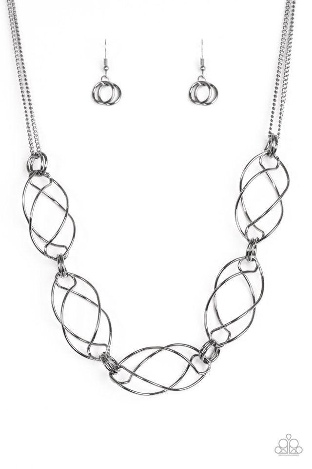 Paparazzi Accessories Burst Into Flames - Black Infused with doubled gunmetal chains, whirling gunmetal frames link below the collar for a bold industrial look. Features an adjustable clasp closure. Sold as one individual necklace. Includes one pair of ma
