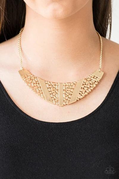 Paparazzi Accessories Terra Trailbreaker ~Gold Varying in shape, a collection of dainty gold frames coalesce into a striking crescent pendant below the collar for a statement making look. Features an adjustable clasp closure. Sold as one individual neckla