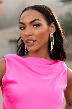 Paparazzi Accessories A-Lister Affirmations - Multi A tapered fringe of glittery white rhinestones streams out from the bottom of a rectangular silver frame. Dotted in rows of blinding white rhinestones, the center of the glitzy fitting is infused with a
