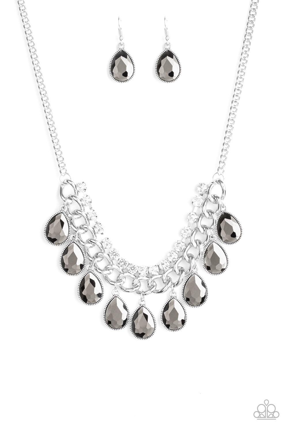 Paparazzi Accessories All Toget-HEIR Now - Silver Teardrop hematite rhinestones swing from the bottom of a bold silver chain, creating a dramatic fringe below the collar. A strand of glittery white rhinestones attach to the top of a shimmery silver chain,