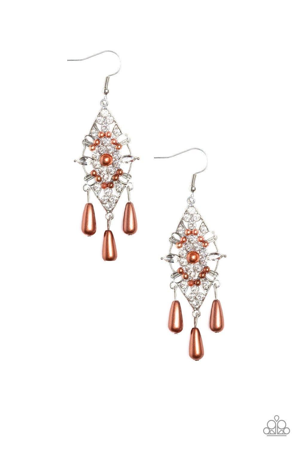 Paparazzi Accessories Majestic Mood - Brown Dotted with dainty brown pearls, a silver kite-shaped frame is encrusted in glassy white rhinestones. Teardrop pearls swing from the bottom of the sparkling frame for a refined flair. Earring attaches to a stand