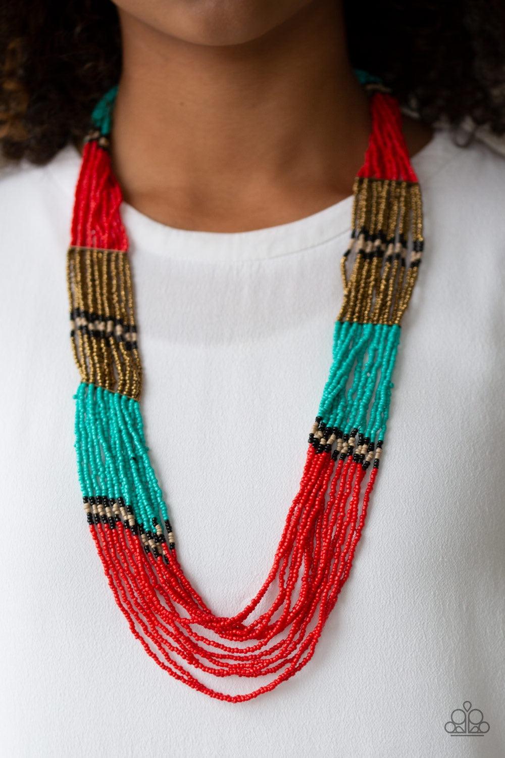 Paparazzi Accessories Rio Roamer - Red An assortment of black, brass, red, tan, and turquoise seed beads are threaded along invisible wires, creating colorful layers across the chest. Features an adjustable clasp closure. Jewelry