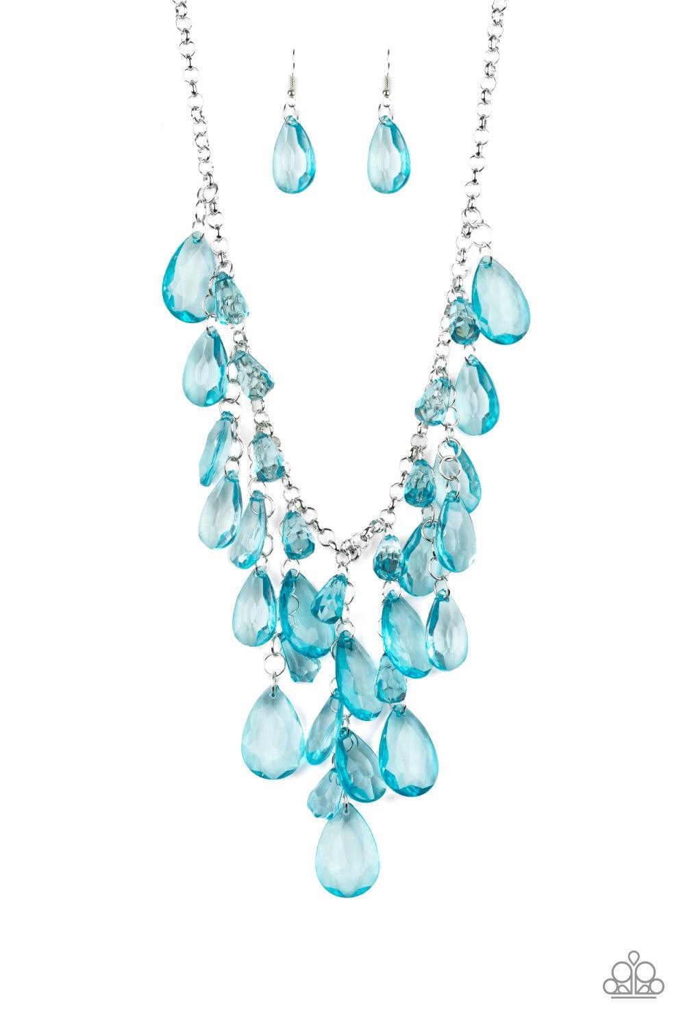 Paparazzi Accessories Irresistible Iridescence - Blue Glassy blue teardrop beads swing from the bottom of a shimmery silver chain. Matching beads trickle down free-falling chains, creating a glamorous fringe below the collar. Features an adjustable clasp
