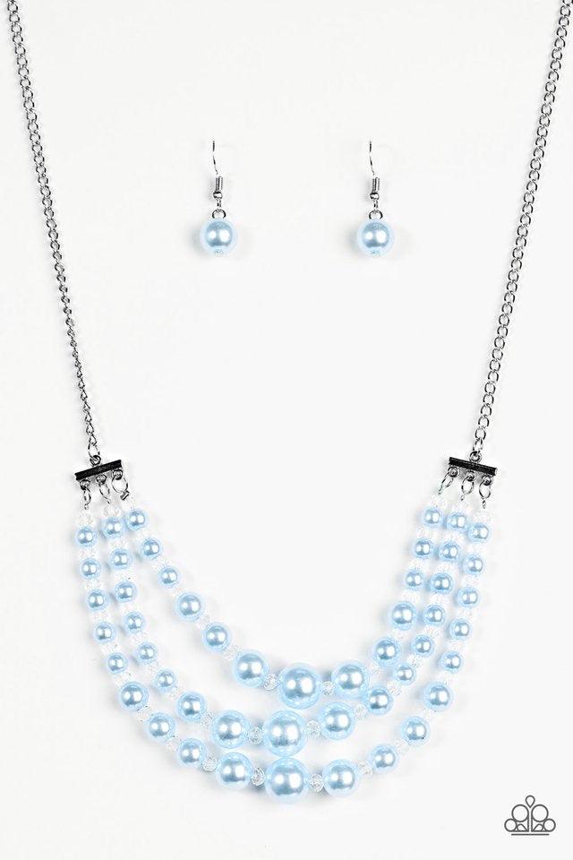 Paparazzi Accessories Spring Social - Blue Varying in size, three strands of timeless blue pearls swing from the bottom of a shimmery silver chain. Dainty crystal-like beads are sprinkled between the pearl accents, adding classic shimmer to the elegant pa