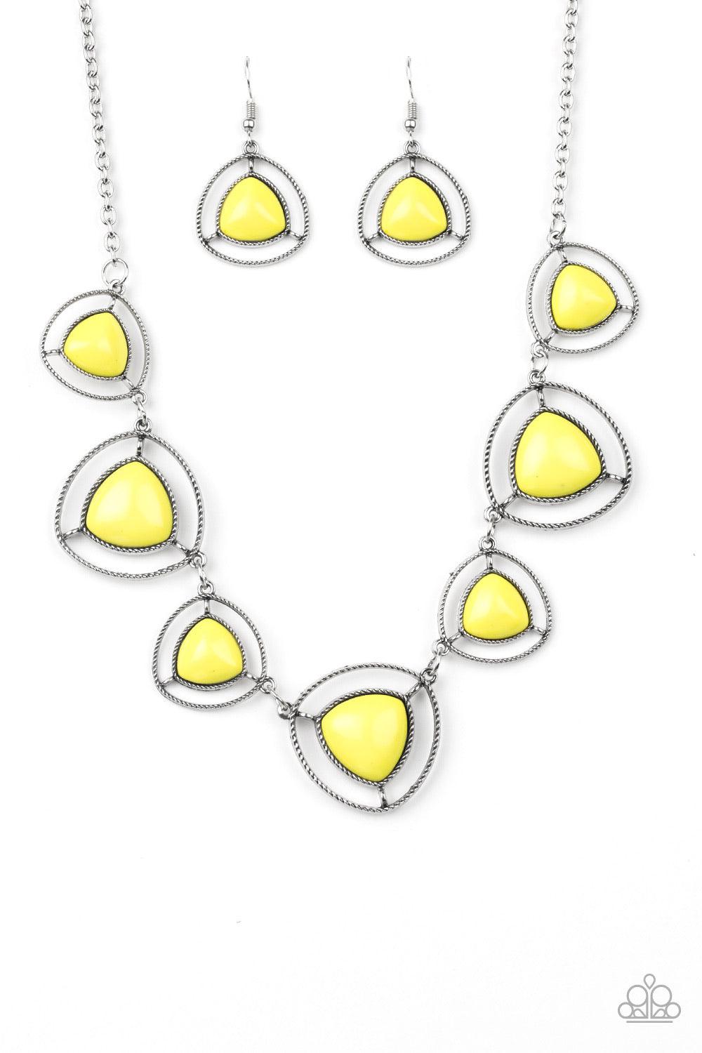Paparazzi Accessories Make A Point - Yellow Varying in size, pyramidal yellow beads are encased in airy silver frames and linked below the collar for a trendsetting look. Features an adjustable clasp closure. Jewelry
