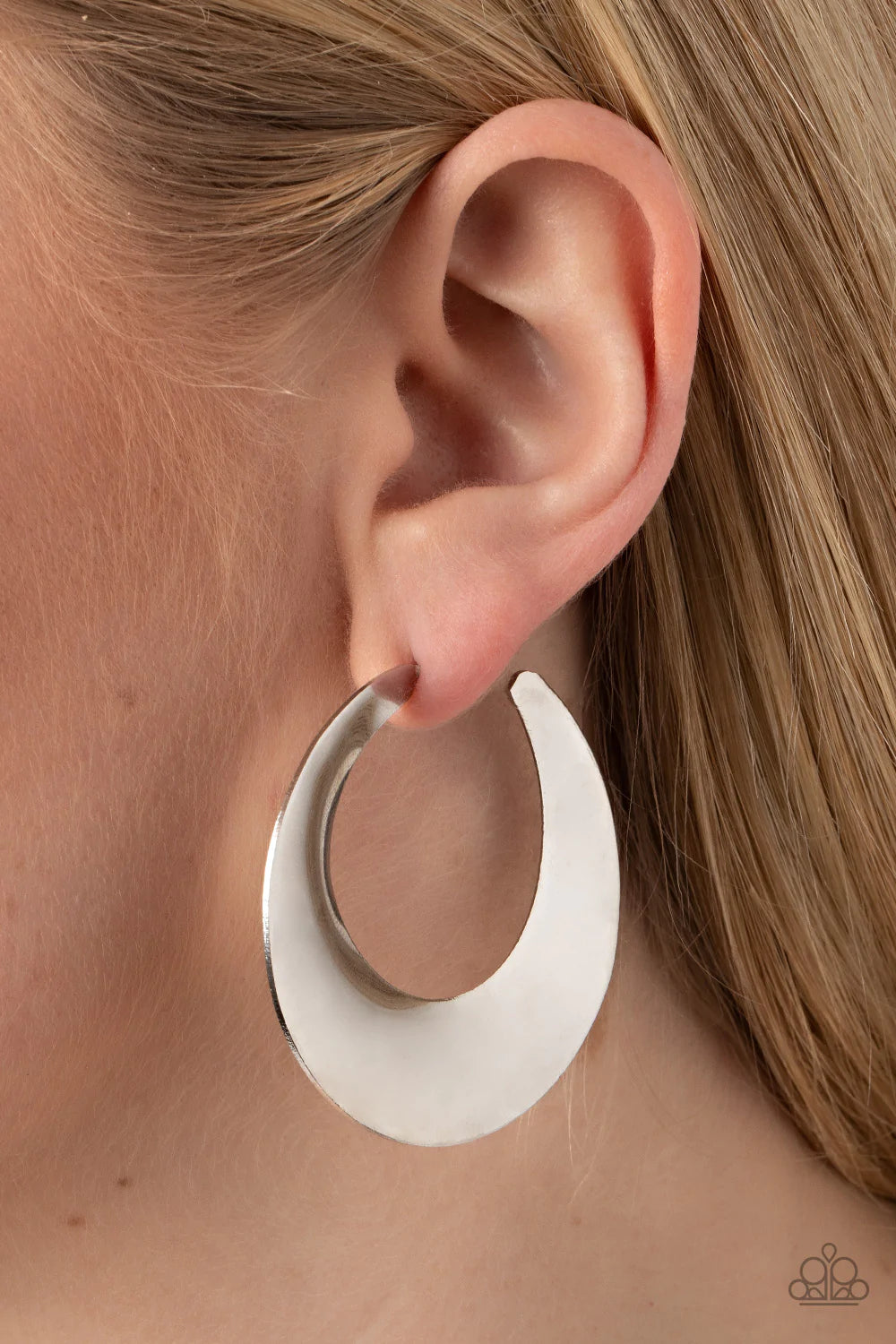 Paparazzi Accessories Power Curves - Silver A flat silver hoop widens and bevels at the center, curving into a dramatic shimmer. Earring attaches to a standard post fitting. Hoop measures approximately 2" in diameter. Sold as one pair of hoop earrings. Ea