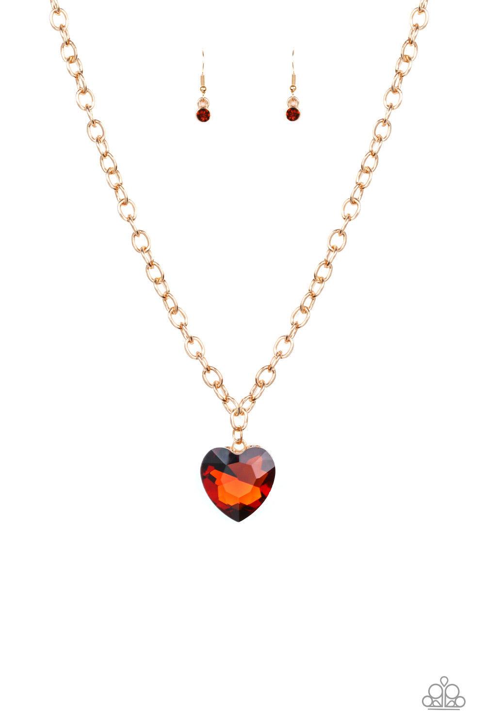Paparazzi Accessories Flirtatiously Flashy - Brown Set atop a sleek gold fitting, a topaz heart-shaped gem swings from the bottom of a classic gold chain below the collar for a whimsical look. Features an adjustable clasp closure. Jewelry
