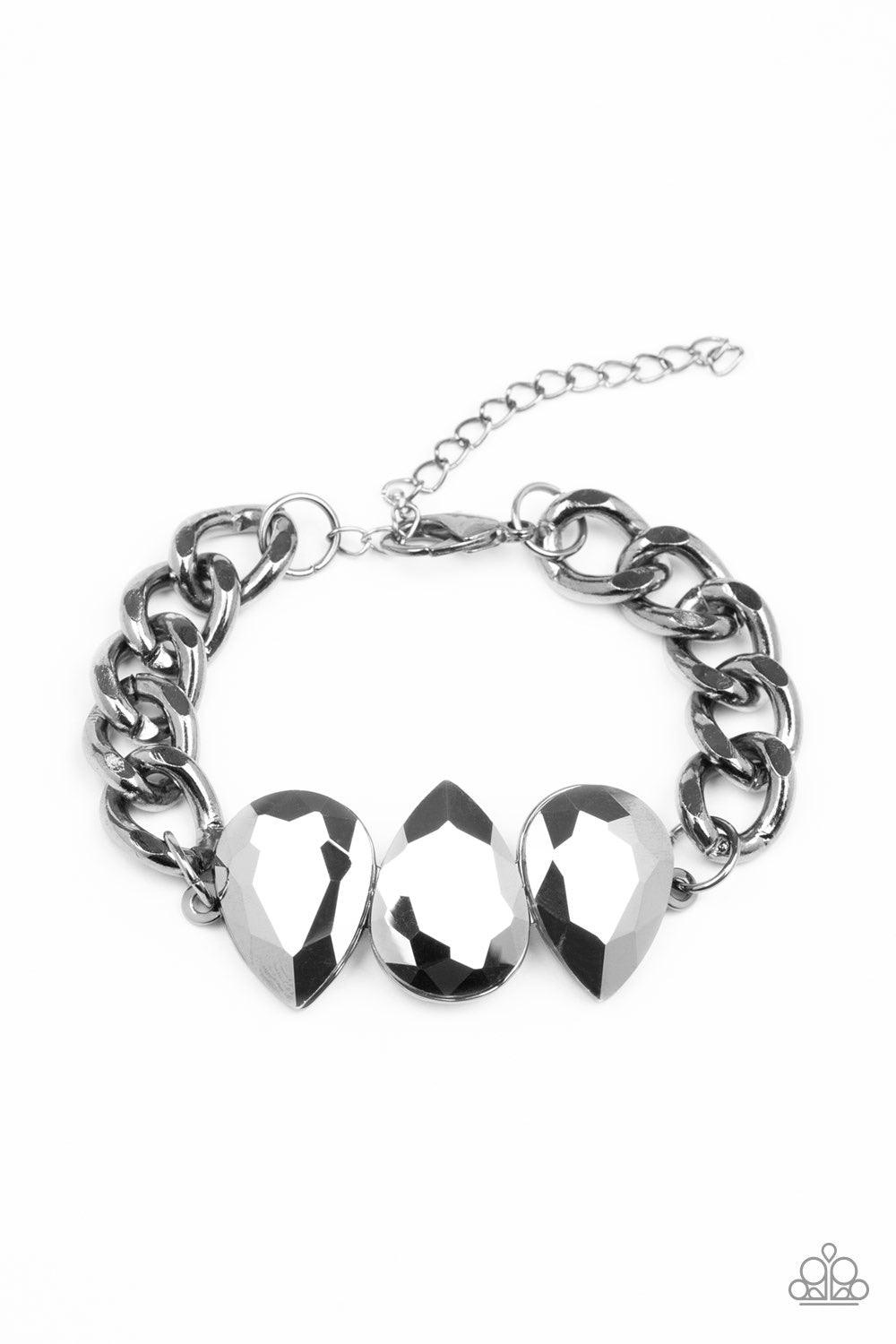 Paparazzi Accessories Bring Your Own Bling - Black Three oversized hematite teardrop gems join at the center of a dramatic gunmetal chain, creating a jaw-dropping display across the wrist. Features an adjustable clasp closure. Jewelry